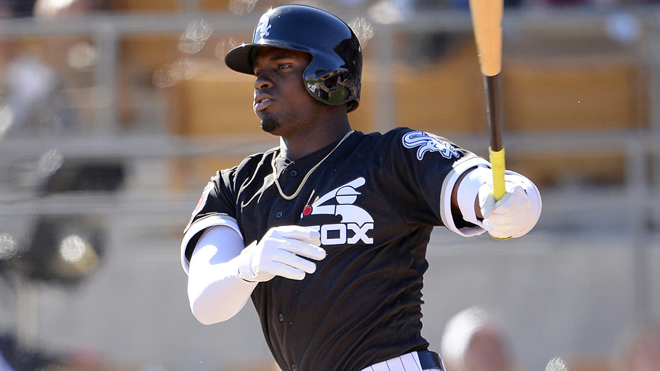 Luis Robert Jr. #88 of the Chicago White Sox reacts after hitting